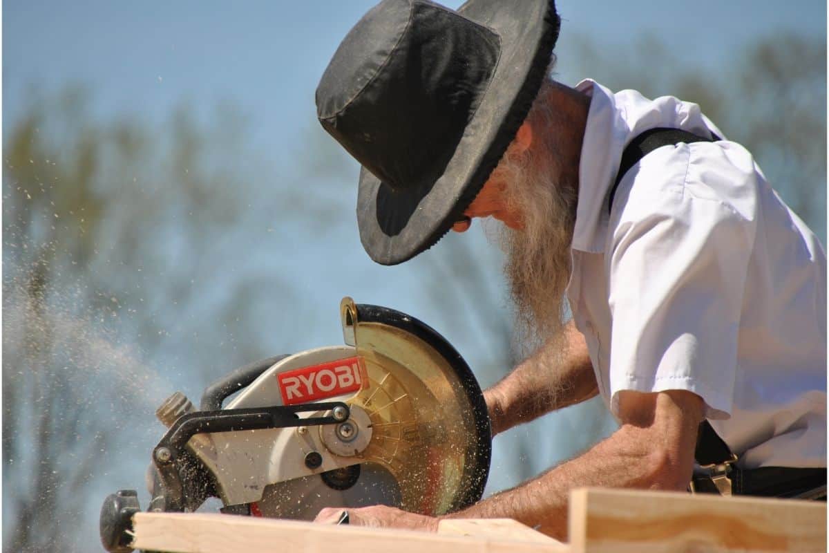 man working with circular saw