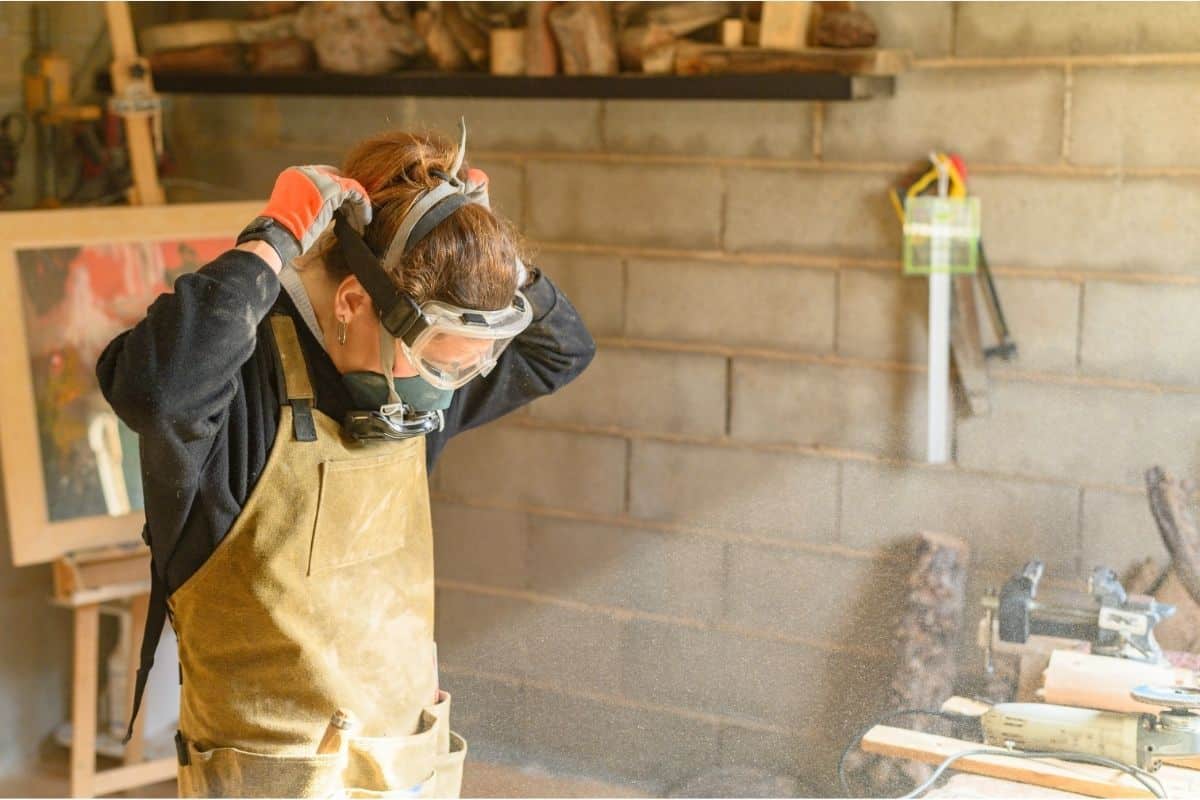 person wearing protection for woodwork