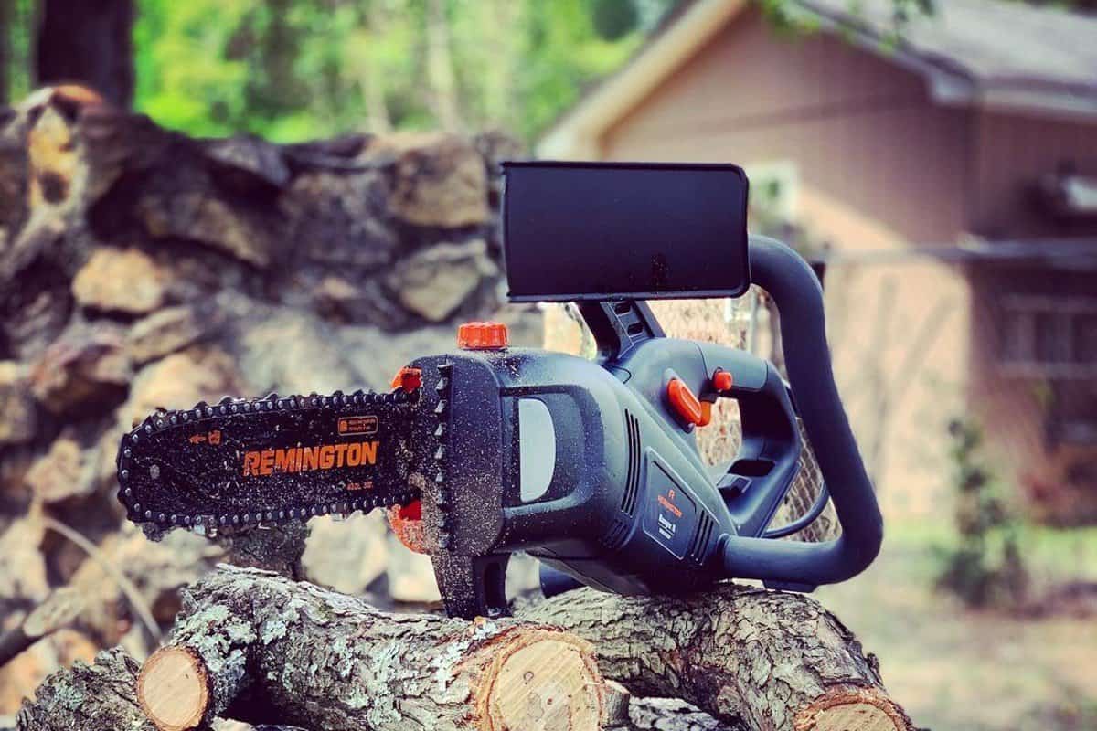 remington chainsaw on wooden logs