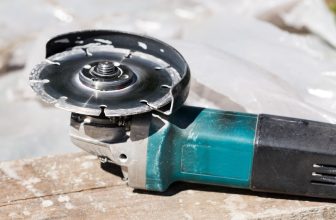 angle grinder lies on the table